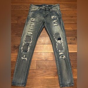 Crysp Denim Distressed Blue Jeans